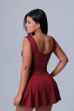 ENTERIZO MUJER CORTES LATERALES VINOTINTO