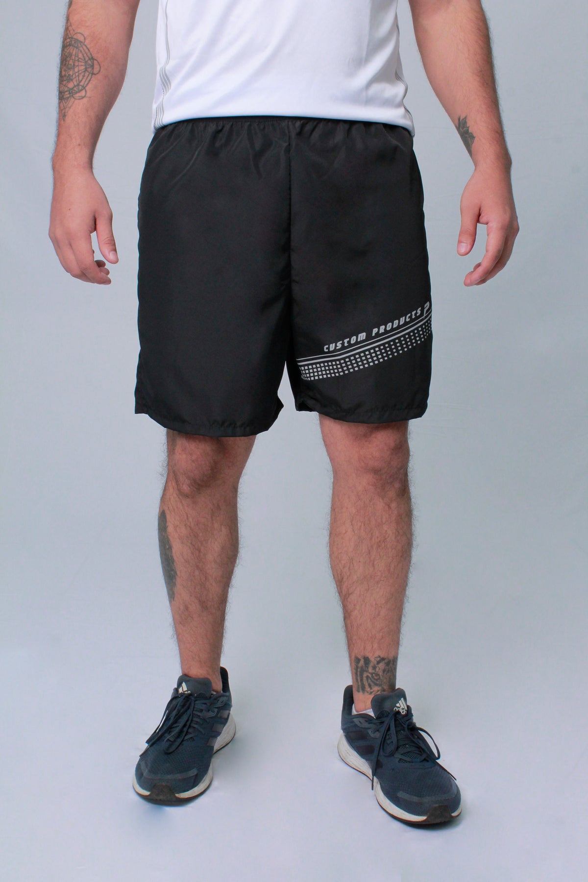 Pantaloneta deportiva hombre estampado delantero